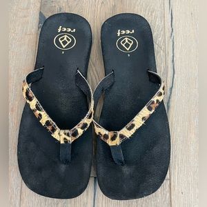 Reef leopard print flip flops
